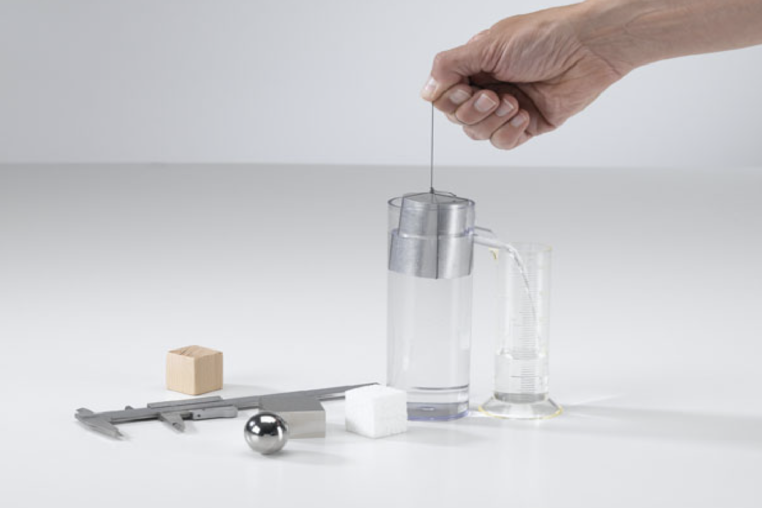 Determining the volume and density of solids